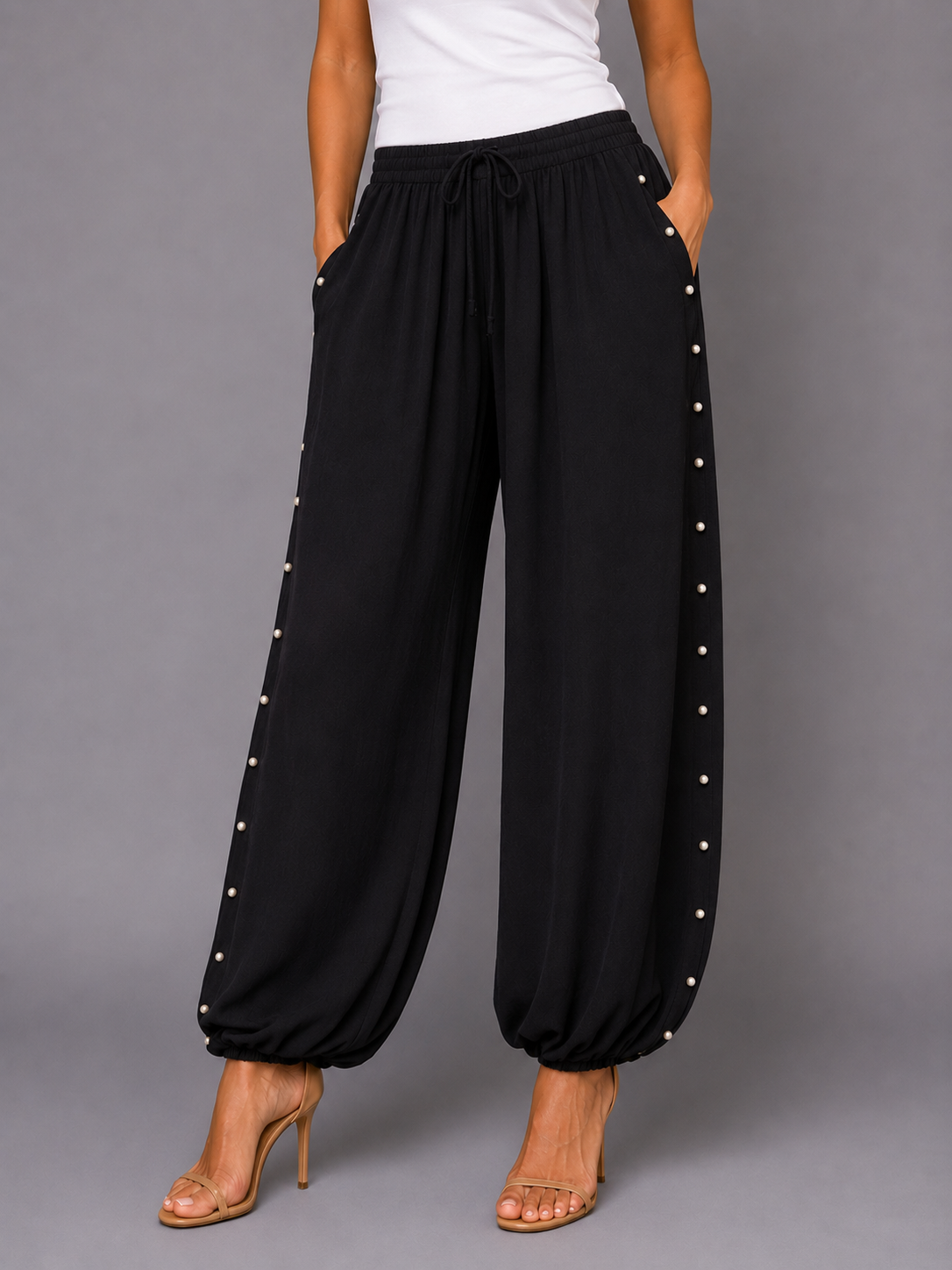 PANTALONES TACHUELAS