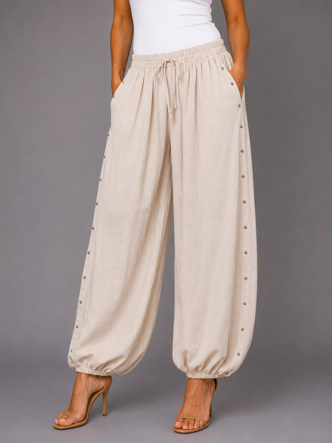 PANTALONES TACHUELAS